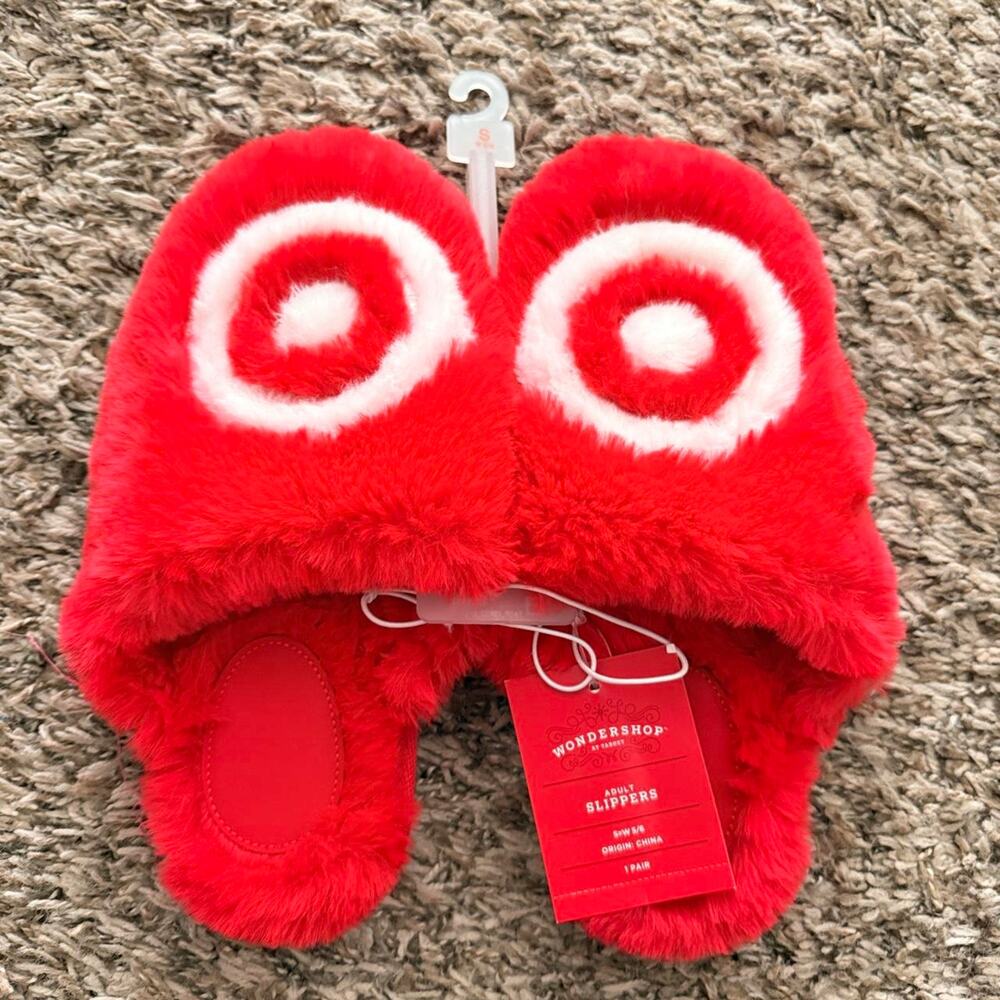 Red fuzzy target slippers with